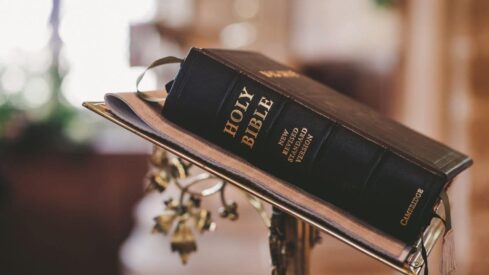 the bible on the standing stool