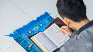 A Muslim reading and learning Quran