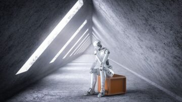 روبوت جالس على صندوق برتقالي في ممر ضيق مضاء بنوافذ مثلثة الشكل، مع جدران خرسانية. يعبّر المشهد عن الوحدة والتأمل في عالم التكنولوجيا.