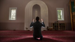 young Muslim praying