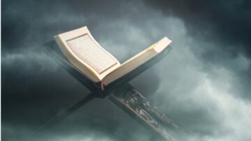 Open book resting on a stand, surrounded by soft, swirling clouds. The pages display intricate text, suggesting a focus on literature or spirituality. The ethereal background enhances the book's significance, evoking a sense of contemplation and reverence.