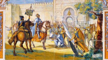 صورة تُظهر لوحة جدارية ملونة تُبرز مشهدًا تاريخيًا من العصور الوسطى، حيث يظهر فرسان على ظهور الخيل ومرتزقة يحملون أسلحة. في المقدمة، يتلقى شخصية رئيسية تاجًا من مجموعة من الأشخاص المحيطين به. الخلفية تتضمن جدران قلعة وعمارة تاريخية، مما يضفي طابعًا تاريخيًا وثقافيًا على المشهد.