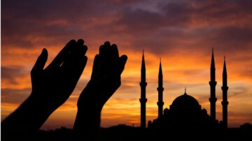 Hands raised in sincere Dua against a sunset, representing the Power of Dua and a deep personal conversation with the Creator