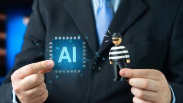 رجل يرتدي بدلة يحمل شريحة إلكترونية مكتوب عليها "AI" وشخصية تمثل لصًا. تعبير عن العلاقة بين الذكاء الاصطناعي والجريمة السيبرانية.