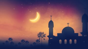 Silhouette of a mosque with a crescent moon against a colorful sunset sky and palm trees, symbolizing the time to rejoice at Eid.