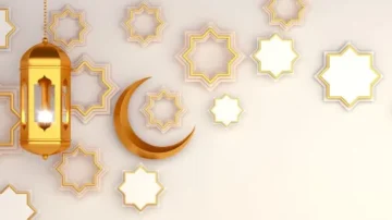 Décor mural avec une lanterne dorée, un croissant de lune et plusieurs motifs étoilés en relief sur un fond clair, évoquant une ambiance festive et culturelle.